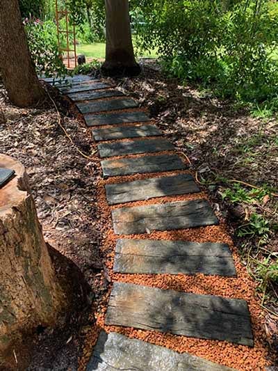 Concrete stepping stones that look like wood