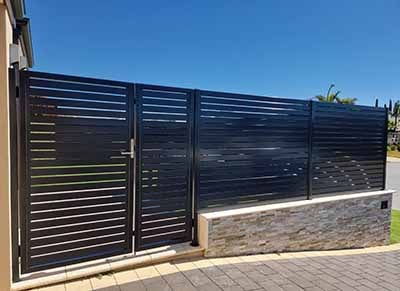 DARK GREY PRIVACY FENCING WITH GATE