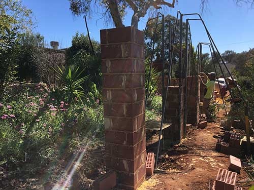 Landscaping construction - brick columns built for boundary wall