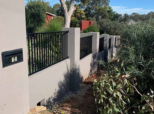 Landscaping construction - completed boundary wall with infill